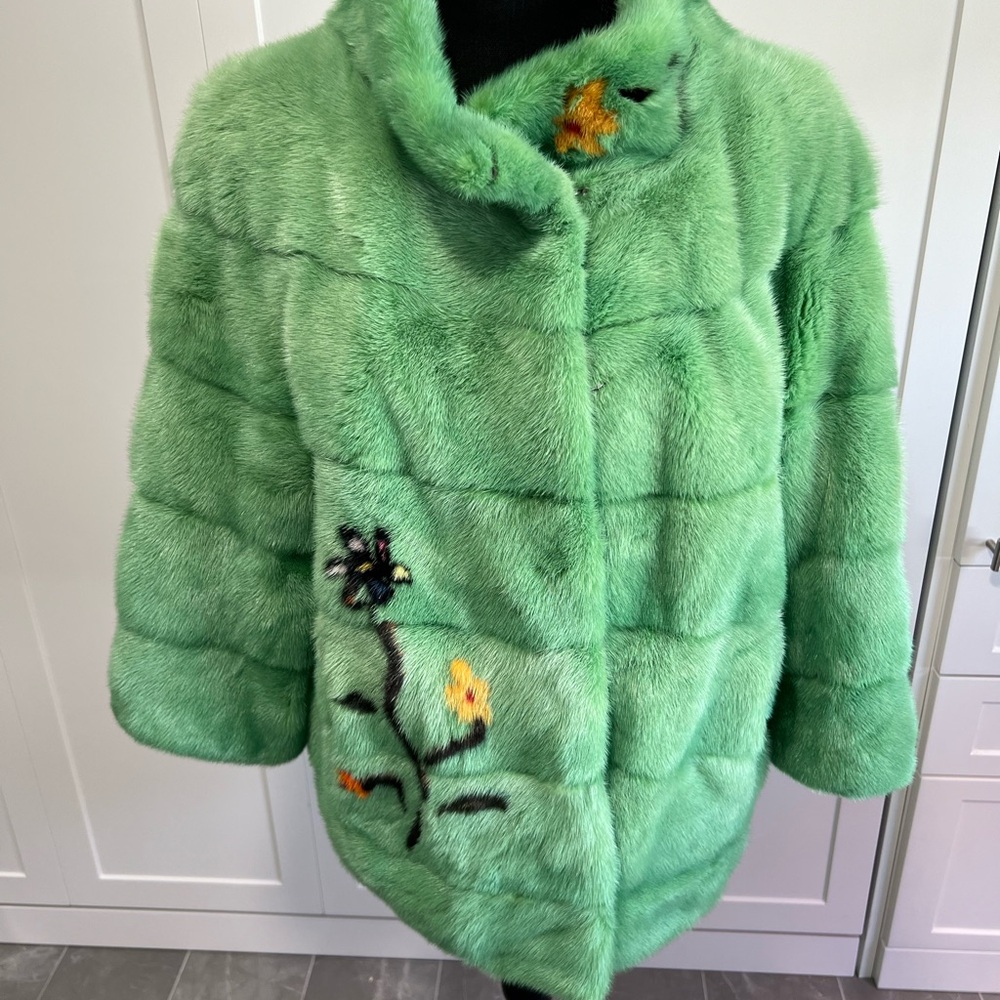 New with tag green mink fur jacket with flower design sz eu44 or a medium.